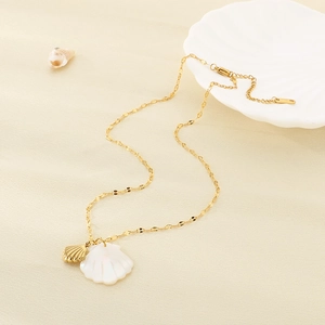 Detail of 18K gold plated starfish and pearlescent shell pendants on a thin link chain