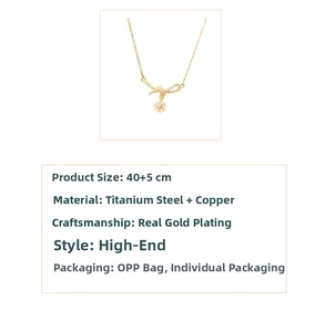 Detailed view of a gold bow pendant necklace with micro-paved crystals and round drop