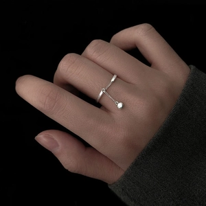 925 silver plated chain ring with a dangling bead charm on a fashion minimalist band