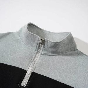 Pull rétro bicolore gris et noir à quart de zip avec détails en maille texturée