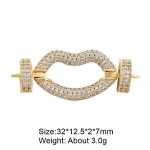 Macro detail of a gold-plated lip-shaped jewelry connector with sparkling zircons