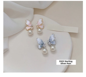 Detail of S925 sterling silver posts on butterfly earrings with drop pearls