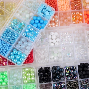 10-grid DIY jewelry kit with colorful macarons glass beads and various shape charms