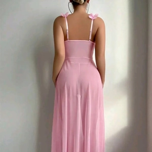 Back view of pink sheer mesh slip dress with 3D bow details and lace trim set