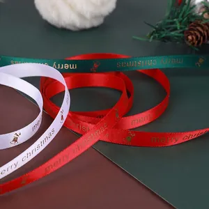 Christmas gold stamped ribbons in red, green and white with Merry Christmas patterns