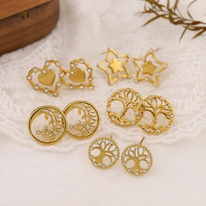 Golden stainless steel earring set with Tree of Life, heart, and star designs and crystals