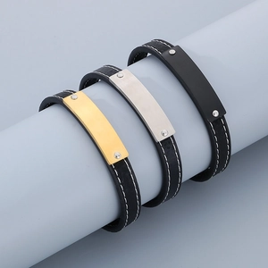 Three leather bracelets with gold, silver, and black stainless steel plates for engraving