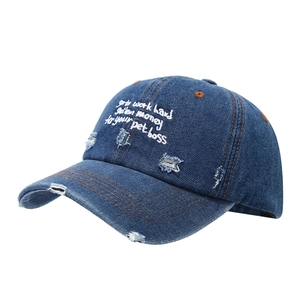 Vintage distressed denim baseball cap with embroidered letters in dark blue and brown