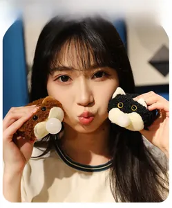 Detail of plush animal hair accessories showing soft fuzzy texture and cute facial features