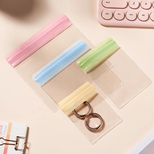 Colorful PVC jewelry storage bags for earrings in pink blue green and yellow colors