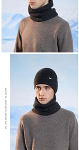 Detail of dark grey winter knit hat and neck warmer set with OK embroidery