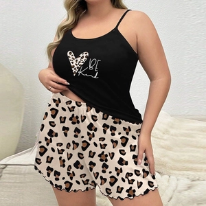 Detail of Be Kind heart print top and leopard shorts ruffle pajama set