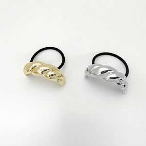 Twisted metal U-shaped hair ties in gold and silver finish with elastic black rubber bands