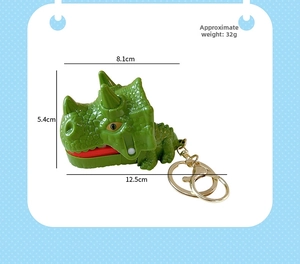 Detailed close-up of green triceratops keychain showing textured scales and size measurements
