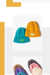 Close-up of fine ribbed knit texture and Add noiti fabric label on the beanie cuff