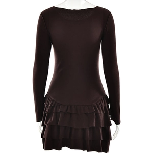 Detail of ruffled hem and knit texture on this black slim fit long sleeve mini dress