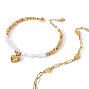 Vintage heart pendant pearl bracelet set with irregular pearls and golden metal beads