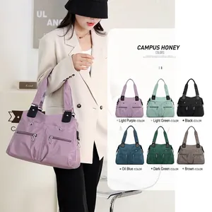Light purple nylon multi-pocket tote bag shown in a group of six different colors