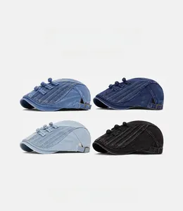 Detail of washed denim berets with pleats and Chinese knots in four different colors