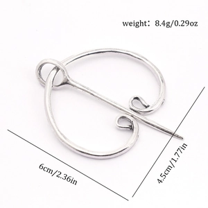 Viking cloak pin size measurement showing 6cm length and 4.5cm height in silver metal