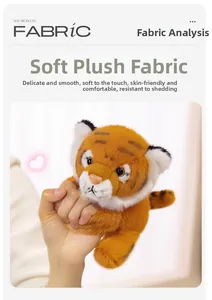 Close-up of the soft plush orange tiger wristband with skin-friendly fabric details