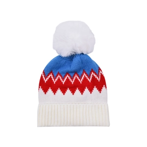 Winter knit beanie with white pompom and colorful blue red wave pattern on white backdrop