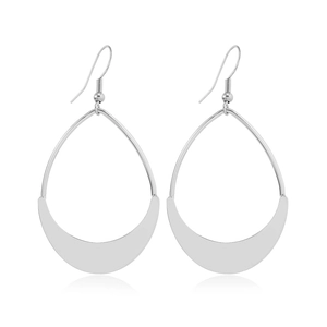 Detailed view of silver layered hollow teardrop and crescent geometric dangle earrings