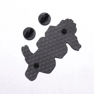 Detailed back view of enamel pin with black alloy honeycomb texture and double rubber clutches