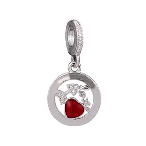 Detail of silver alloy charm with red enamel heart, zircon accents and Love engraving