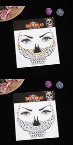 Detailed Day of the Dead face jewels with silver and gold acrylic rhinestones on packaging