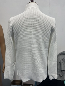 Rear view of men's white waffle knit jacket showing texture on a mannequin