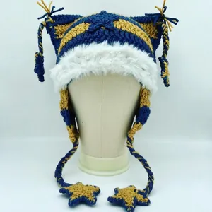 Detail of star pendants on striped cat ear beanie with fuzzy white faux fur trim