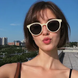 Retro milk tea round sunglasses for women featuring cream frames and black lenses