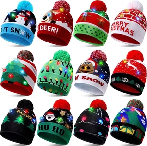 Detail view of 12 festive Christmas knit beanies with integrated LED lights and pom-poms