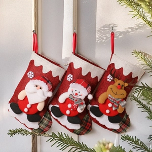 Three-piece Christmas stocking set with Santa Snowman Reindeer hanging decorations