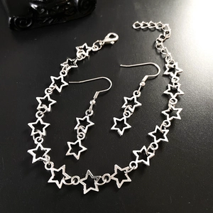 Ensemble bijoux étoile évidée avec collier et boucles d'oreilles argentés chic