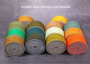 Macro shot of 2mm pineapple cord spools in various colors for DIY jewelry making