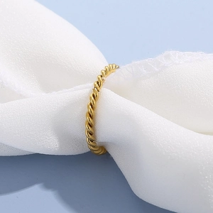 Minimalist gold twisted rope stacking ring in polished stainless steel for men and women