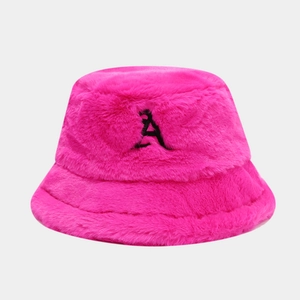 Detailed view of plush rose red faux rabbit fur bucket hat with embroidered black letter A