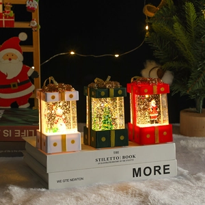 Luminous Christmas gift box lanterns with Santa, Snowman and Tree figures