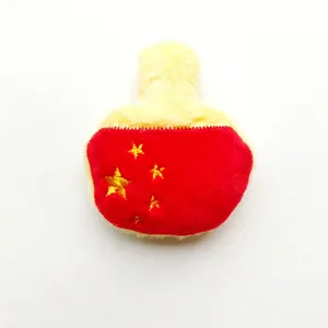 Detail shot of a creative plush racket ornament with star pattern and 8cm by 6.5cm dimensions