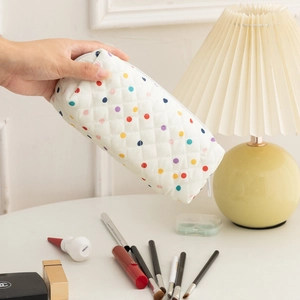Quilted white cotton cosmetic bag with colorful polka dots and a large capacity zipper