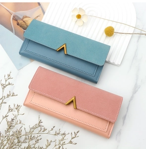 Detailed view of long PU leather wallets in blue and pink with gold V-metal closure