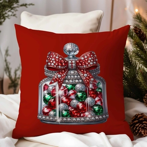 Detail of red Christmas pillowcase featuring a jewel jar pattern and festive bow decoration