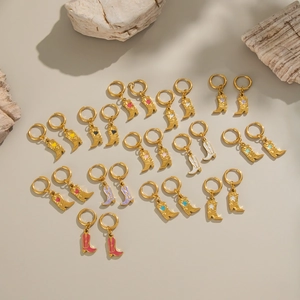 Gold stainless steel hoop earrings with colorful enamel cowboy boot pendants on stone