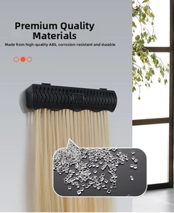 Detail view of durable black ABS wall-mounted hair extension rack showing wavy hook design