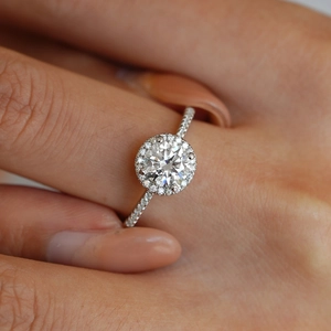 Sparkling S925 sterling silver ring with 1-carat moissanite halo and pavé band