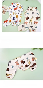 Close-up of cotton-blend pet pajamas featuring colorful cartoon cat and safari animal prints