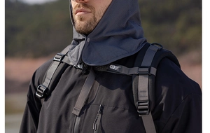 Detail of dark grey sun protection face cover with breathable mesh and snap closures