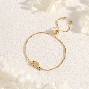 Detail of gold elephant pendant with pavé cubic zirconia on adjustable box chain
